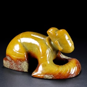 An Archaic Gaogu yu Figure Ornament