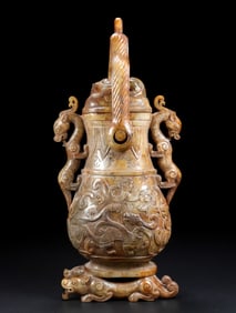 An Archaic Gaogu yu Dragon Pattern Double-Ears Ewer
