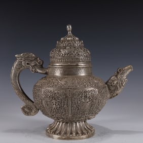 An Exquisite Silver-plated Eight Treasures Pattern Ewer