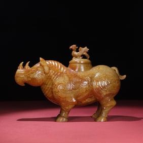An Exquisite White Jade Rhinoceros Vase
