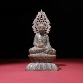 An Exquisite White Jade Statue of Sakyamuni