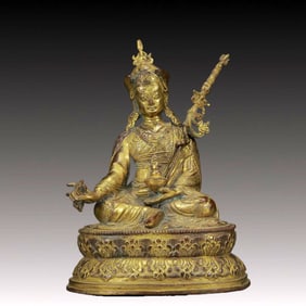 A Solemn Gilt Bronze Statue of Padma Sambhava