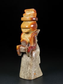 An Archaic Gaogu yu Figure Ornament