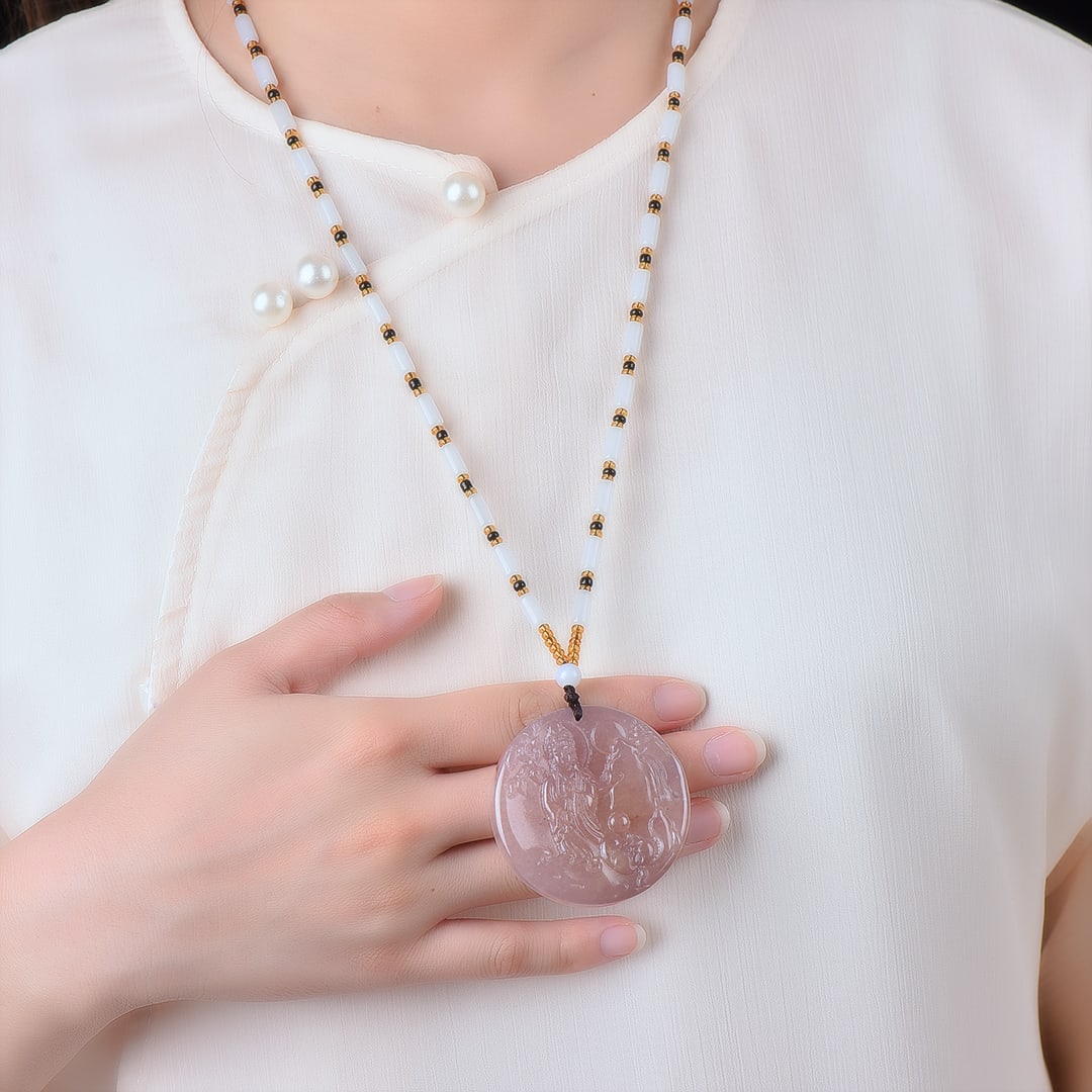 An Exquisite Jadeite Statue of Avalokitesvara Pendant (1 of 3)