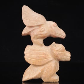 An Archaic Hongshan Culture Yellow Jade Animal Mask Ornament