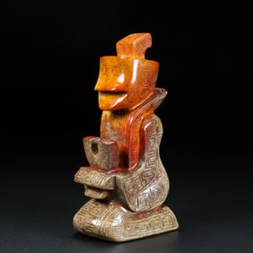 An Archaic Gaogu yu Figure Ornament