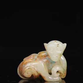An Exquisite White Jade Monkey Ornament