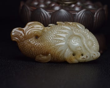 An Exquisite White Jade Fish and Dragon Pendant