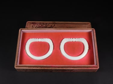 A Pair of Exquisite White Jade Dragon Pattern Bracelets
