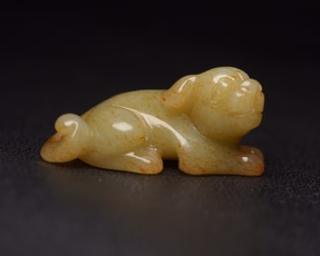 An Exquisite White Jade Auspicious Beast Ornament