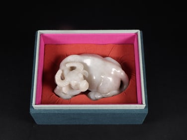 An Exquisite White Jade Buffalo Ornament