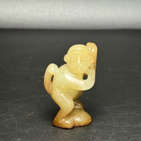 An Exquisite White Jade Monkey Pendant