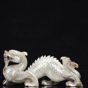An Exquisite White Jade Dragon Ornament