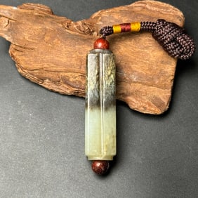 An Exquisite White Jade Pendant