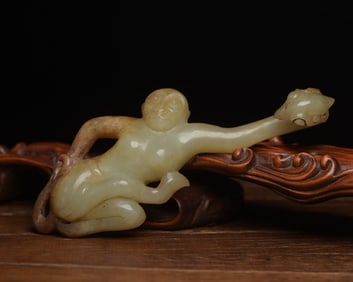 An Exquisite White Jade Monkey Hook