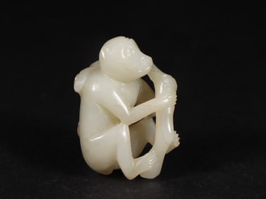 An Exquisite White Jade Monkey Ornament