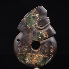 An Archaic Liangzhu Culture Green Jade Pig and Dragon Ornament