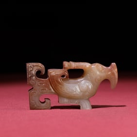 An Exquisite White Jade Bird Hand Piece