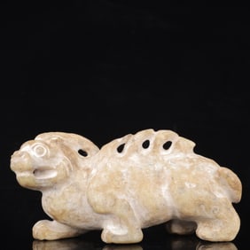An Archaic Hongshan Culture Yellow Jade Animal Ornament