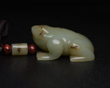 An Exquisite White Jade Frog Pendant