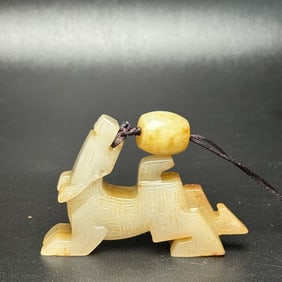 An Exquisite White Jade Dog Pendant