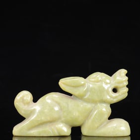 An Archaic Hongshan Culture Yellow Jade Animal Ornament