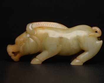 An Exquisite White Jade Buffalo Ornament