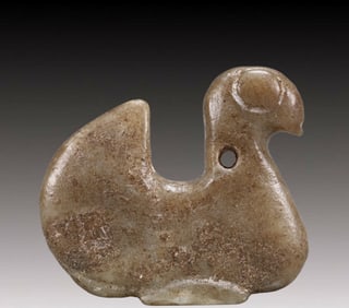 An Archaic Hongshan Culture Yellow Jade Animal Pendant