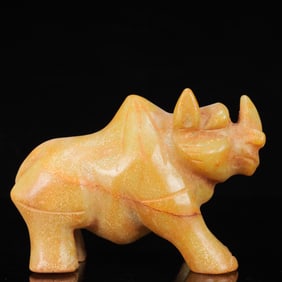An Archaic Hongshan Culture Yellow Jade Buffalo Ornament