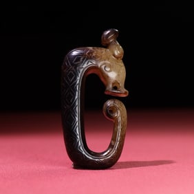 An Exquisite White Jade Dragon Pendant