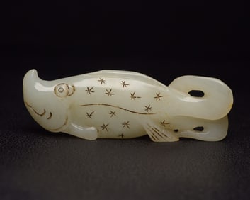 An Exquisite White Jade Fish Pendant