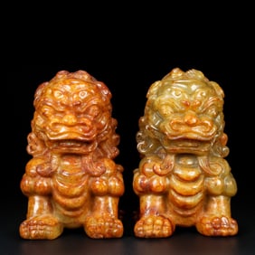 A Pair of Exquisite White Jade Lion Ornaments