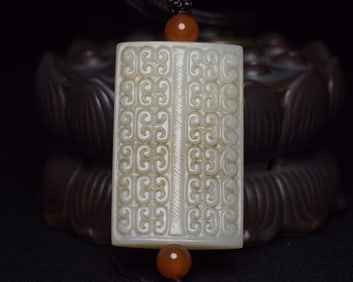 An Exquisite White Jade Pendant