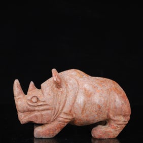 An Archaic Hongshan Culture Yellow Jade Rhinoceros Ornament
