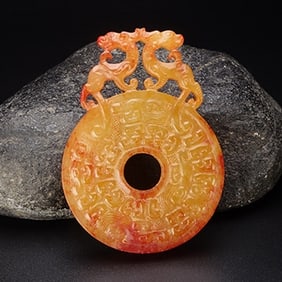 An Exquisite White Jade Dragon Pendant