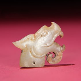 An Exquisite White Jade Dragon Pendant