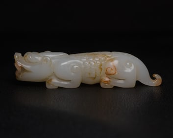 An Exquisite White Jade Auspicious Beast Ornament