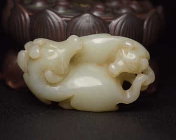 An Exquisite White Jade Auspicious Beast Ornament
