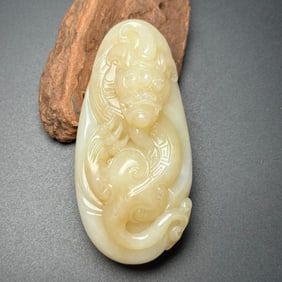 An Exquisite White Jade Dragon Pattern Hand Piece
