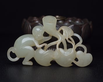 An Exquisite White Jade Monkey Pendant