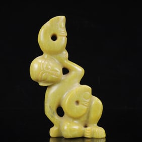 An Archaic Hongshan Culture Yellow Jade Figure Ornament