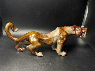 An Exquisite Gaogu Jade Tiger Ornament