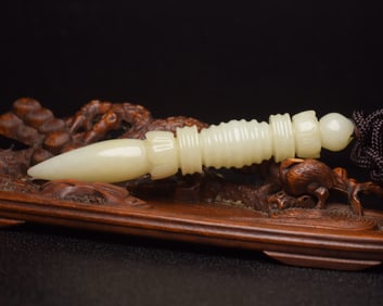 An Exquisite White Jade Pendant