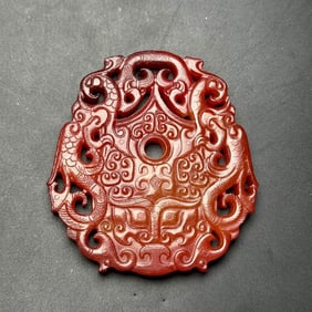 An Exquisite White Jade Beast-Face and Dragon Pattern Pendant