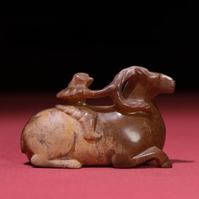 An Exquisite White Jade Sheep Hand Piece