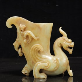 An Exquisite White Jade Auspicious Beast Cup