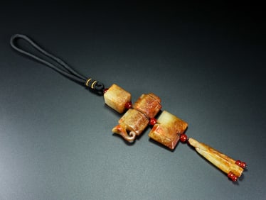 An Exquisite White Jade Pendant