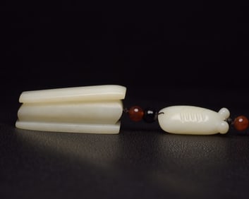 An Exquisite White Jade Pendant