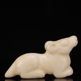 An Archaic Hongshan Culture White Jade Dog Pendant