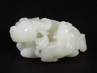 An Exquisite White Jade Buffalo Ornament